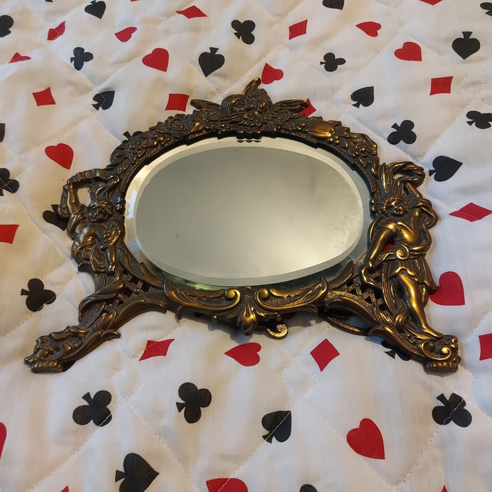 Vintage Ornate Cherub Vanity Mirror Beveled Oval Glass Antique Brass Tone Stand